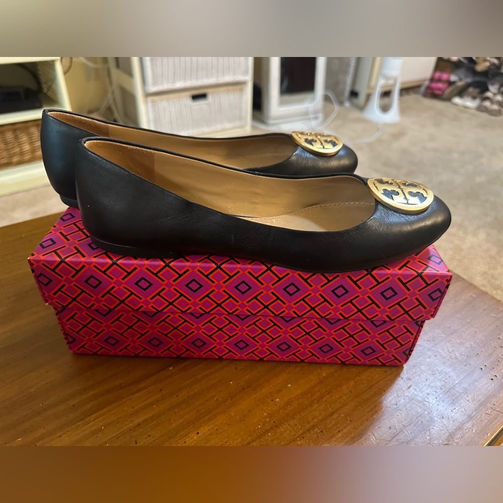 Tory Burch Black Flats with Gold Logo (size 7.5) Gently Used Condition.